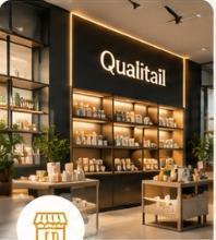 Modern retail commerce showroom with Qualitail sign